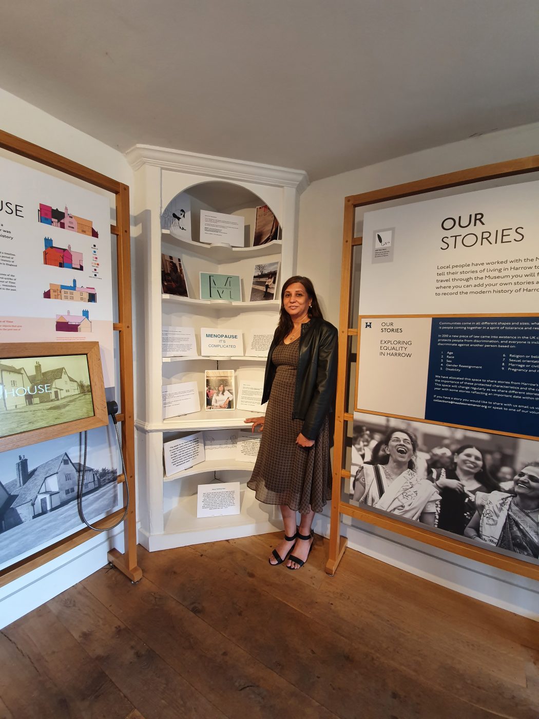 This image shows Madhu from M for Menopause standing next to the exhibition she curated. This was installed for Menopause Awareness Month and is in our community cupboard space.